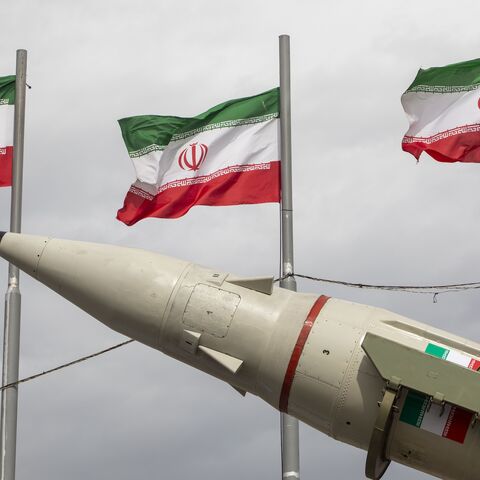 Missiles produced by Iran's armed forces are displayed near a row of Iranian flags during commemorations to mark the anniversary of the 1979 Iranian Revolution on February 11, 2026, in Tehran, Iran. 