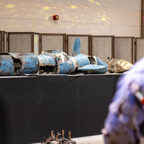 Pieces of missiles and drones recovered after Iran's strikes are displayed during a press briefing by the UAE government held in Abu Dhabi on March 3, 2026. 
