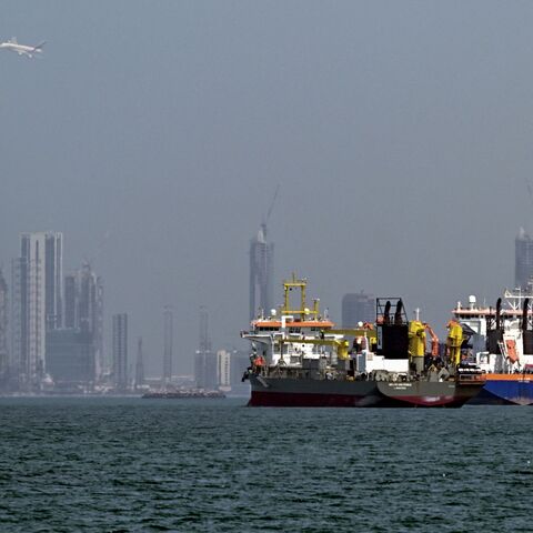Commercial vessels are pictured offshore in Dubai on March 11, 2026. AFP via Getty Images