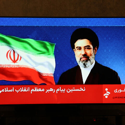 This photo taken in Tehran shows a statement by Iran's new supreme leader Mojtaba Khamenei being televised on March 12, 2026. Iran's new supreme leader ordered the vital Strait of Hormuz oil shipping lane to remain closed on March 12, while US President Donald Trump said stopping the Islamic republic's "evil empire" was more important than crude prices. Ayatollah Mojtaba Khamenei, who was reportedly injured in an air strike, has yet to appear publicly since his nomination as supreme leader, and his defiant 