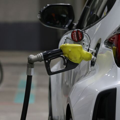 A fuel pump is seen while refuelling a car at a gas station on March 13, 2026 in Kobe, Japan. Japan will release oil reserves to address the rise in gasoline and other petroleum products prices starting next Monday, said Prime Minister Takaichi Sanae. The International Energy Agency (IEA) stated that its member countries agreed to release the largest volume of emergency oil reserves in its history, responding to the disruption in energy markets caused by the Middle East War. (Photo by Buddhika Weerasinghe/G