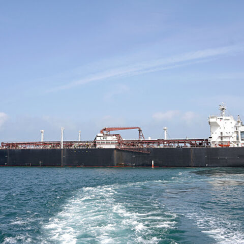 Indian vessel 'Nanda Devi' carrying liquefied petroleum gas (LPG) arrives at Vadinar Port in the Jamnagar district of Gujarat state on March 17, 2026 after Iran allowed it to pass through the Strait of Hormuz, a key energy corridor that remains disrupted by the Middle East war. Indian-flagged tankers 'Shivalik' and 'Nanda Devi', carrying around 92,700 metric tonnes of LPG, had reached ports in Gujarat state, marking a rare exception in commercial passage through the chokepoint. (Photo by AFP via Ge