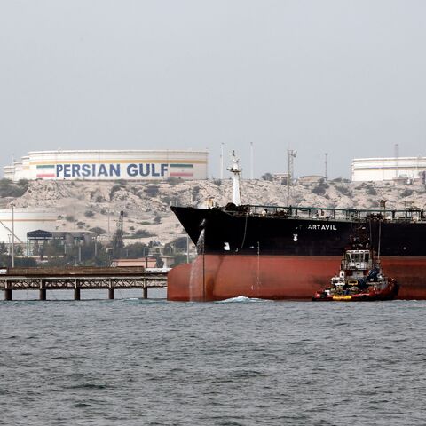 A picture taken on March 12, 2017, shows an Iranian tanker docking at the platform of the oil facility in the Khark Island, on the shore of the Gulf.
