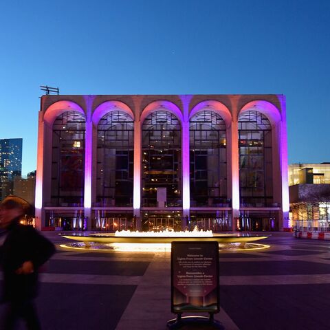 A person walks past the closed Metropolitan Opera at Lincoln Center on Jan. 7, 2021, in New York City.