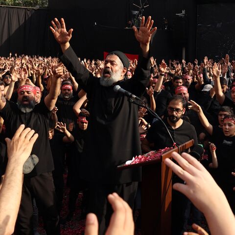 Mahmoud Karimi, a maddah, leads a mourning ritual during the Muslim month of Muharram in the lead-up to Ashura, a 10-day period commemorating the seventh century killing of Prophet Mohammed's grandson Imam Hussein in Tehran on July 3, 2025.