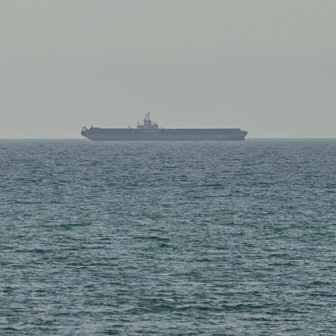A ship is seen off the coast of Ras al-Khaimah, the day after the failure of US-Iran peace talks on April 13, 2026. The failure of US-Iran peace talks has left the US president with several unpalatable options, as analysts say his order to blockade the strategic Strait of Hormuz could further complicate his next move on April 12, 2026. Any hopes that the US vice president would emerge from the marathon day of negotiations with top Iranian officials with a deal to end a war that has rippled across the Middle