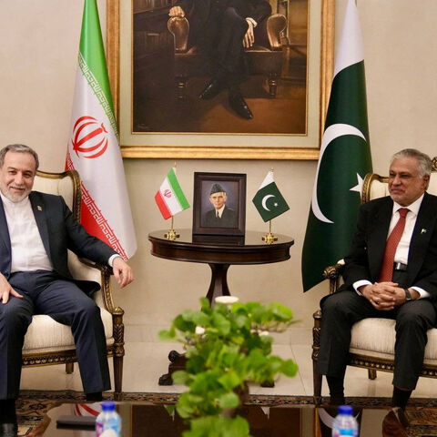 Iran's Foreign Minister Abbas Araqchi meets with Pakistan's Foreign Minister Ishaq Dar, as Pakistan prepares to host the U.S. and Iran for the second phase of peace talks, in a location given as Islamabad, Pakistan, released April 25, 2026. ESMAEIL BAQAEI VIA X/Handout via REUTERS