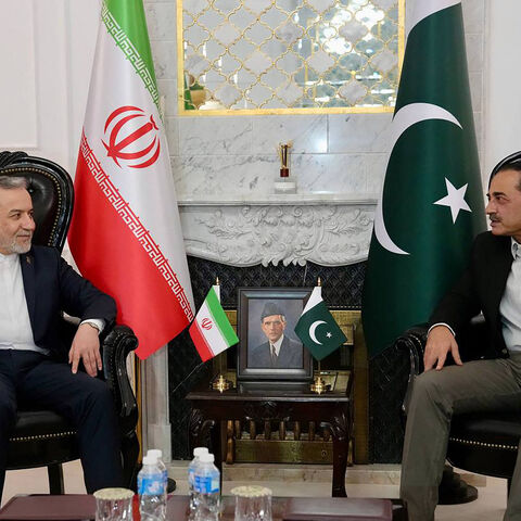 This handout photo released by the Iranian Foreign Ministry on April 25, 2026 shows Pakistan's Army Chief and Field Marshal Syed Asim Munir (R) meeting with Iran's Foreign Minister Abbas Araghchi upon his arrival in Islamabad. US envoys headed to the Pakistani capital on April 25 in a bid to kickstart a new round of peace negotiations with Iran amid a fragile ceasefire, though the prospect of direct talks remained uncertain. (Photo by Iranian Foreign Ministry / AFP via Getty Images) / XGTY / RESTRICTED TO E