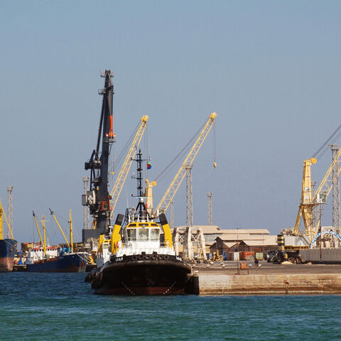 TO GO WITH STORY by Peter Martell: "Eritrea-economy-port": A couple of boats and two tug boats can be seen in Eritrea's Red Sea port of Massawa on November 18, 2007. Once one of East Africa's busiest ports, the town is still recovering after being badly bombed in 1990 during Eritrea's war of liberation from Ethiopia. The government is trying to revitalize the port, but efforts are hampered by a sluggish economy and threat of a renewed conflict with Ethiopia. AFP PHOTO/Peter MARTELL (Photo credit should read