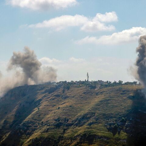 A photograph taken from the Marjayoun area in southern Lebanon shows smoke rising after an Israeli air strike on the village of Arnoun on May 30