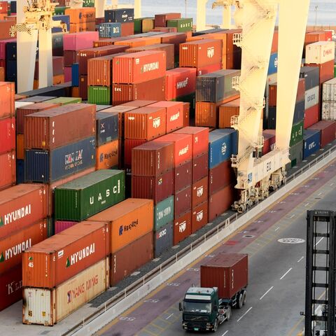 Containers are stacked at the port of Jebel Ali, operated by the Dubai-based giant ports operator DP World, in the southern outskirts of the Gulf emirate of Dubai, on June 18, 2020. — KARIM SAHIB/AFP via Getty Images