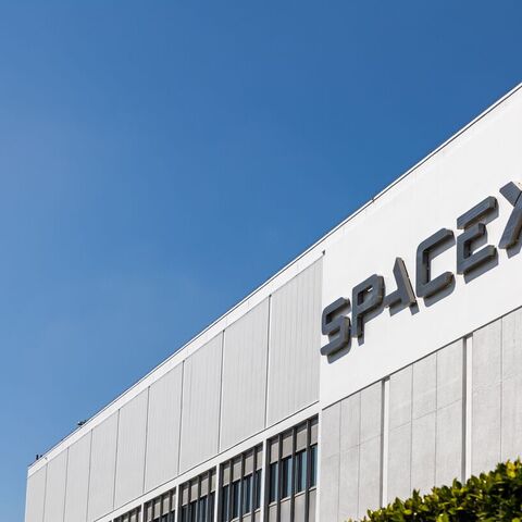 The headquarters of SpaceX in Hawthorne, California, with a Falcon 9 booster in March 2024. — Getty Images