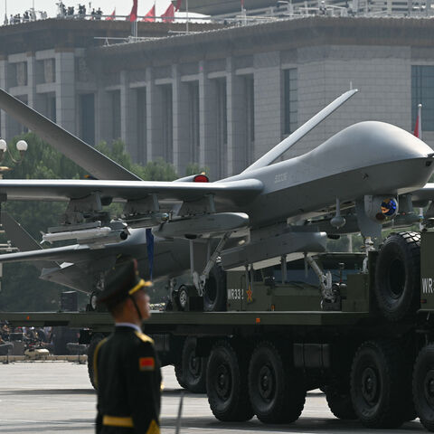 An unmanned aerial vehicle is seen during a military parade marking the 80th anniversary of victory over Japan and the end of World War II, in Beijing's Tiananmen Square on September 3, 2025. (Photo by GREG BAKER / AFP) (Photo by GREG BAKER/AFP via Getty Images)