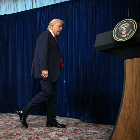 US President Donald Trump and Israeli Prime Minister Benjamin Netanyahu arrive to speak to journalists during a joint press conference at Trump's Mar-a-Lago residence in Palm Beach, Florida, on December 29, 2025. US President Donald Trump hosted Israeli Prime Minister Benjamin Netanyahu in Florida on December 29 for crucial talks on moving to the next stage of the fragile Gaza truce plan.The two leaders also discussed Iran, with Trump saying that if Tehran rebuilt its nuclear facilities the United States wo