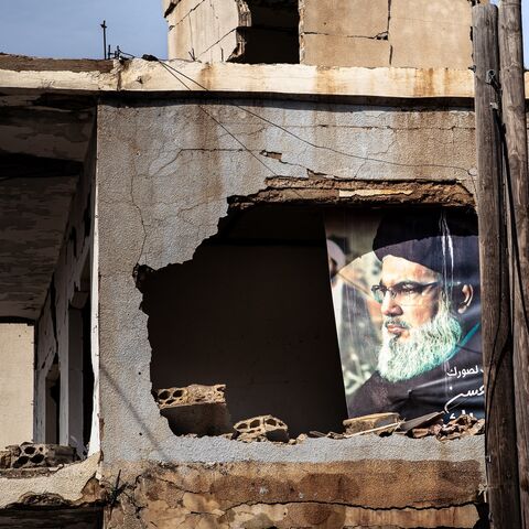 A portrait of the late Hezbollah leader Hassan Nasrallah is visible in heavily damaged building in the border town of Ayta al-Chaab, southern Lebanon, Feb. 21, 2026. 