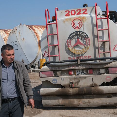 A worker at a market for fuel oil and automotive fuel on March 17, 2026, in Erbil, Iraq. 