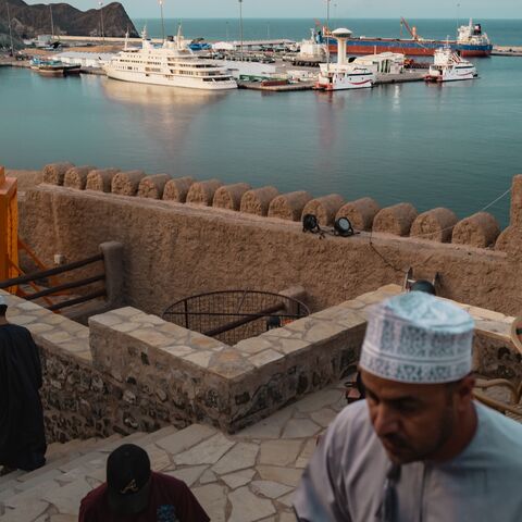 Oil tankers and high-speed crafts anchored near the Strait of Hormuz, Muscat, Oman, March 30, 2026.