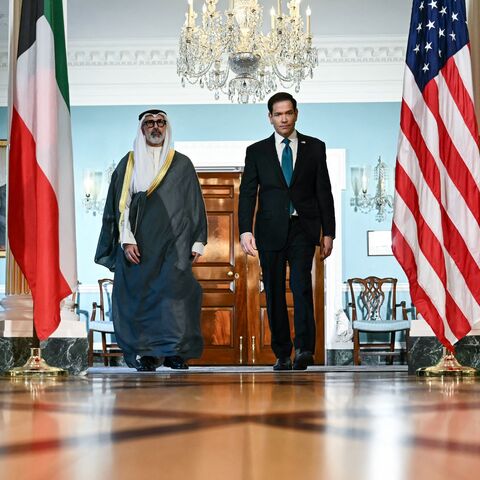 US Secretary of State Marco Rubio and Kuwaiti Foreign Minister Sheikh Jarrah Jaber Al-Ahmad Al-Sabah walk together during a brief appearance for the press as they meet at the State Department in Washington, DC, on June 4, 2026. 