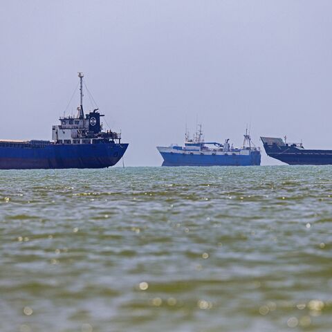 In this picture obtained from Iran's ISNA news agency on June 18, 2026, vessels are seen anchored in Bandar Abbas along the Strait of Hormuz. 