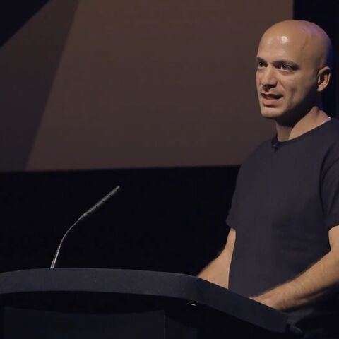  Hassan Akkad speaks about fleeing Syria in 2015 and his work as a filmmaker at a BAFTA event, Sept. 2023.