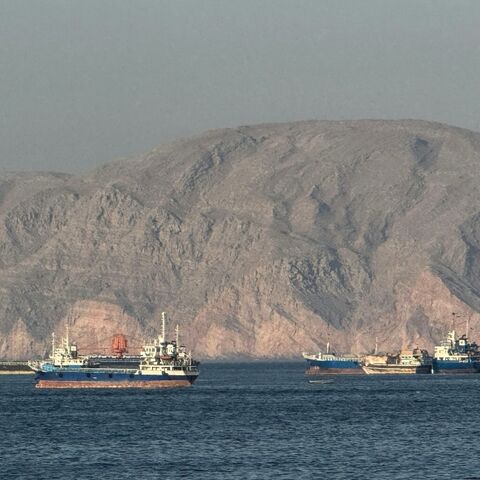 Vessels anchored in the Strait of Hormuz, off the coast of Oman on May 17, 2026