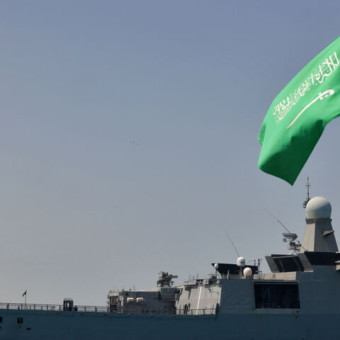A Saudi navy ship is pictured docked at King Faisal navy base in Jeddah before the departure of a team to Port Sudan to help with the evacuation efforts of people fleeing Sudan, on April 29, 2023. 