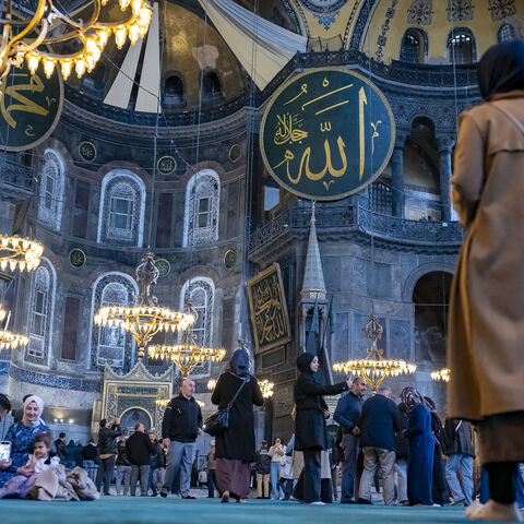 Visitors stand inside Hagia Sophia Grand Mosque in Istanbul on April 14, 2025.