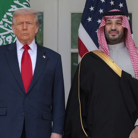 US President Donald Trump (L) and Crown Prince and Prime Minister Mohammed bin Salman of Saudi Arabia pause for photographs along the West Wing Colonnade at the White House on Nov. 18, 2025, in Washington.