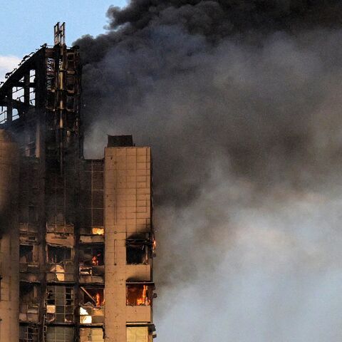 moke rises from a high-rise building following a drone attack in Kuwait City on March 8, 2026. 