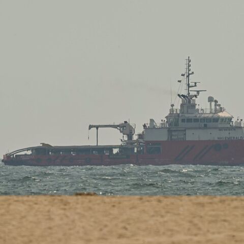 A ship sails off the coast of Ajman on July 10, 2026. 