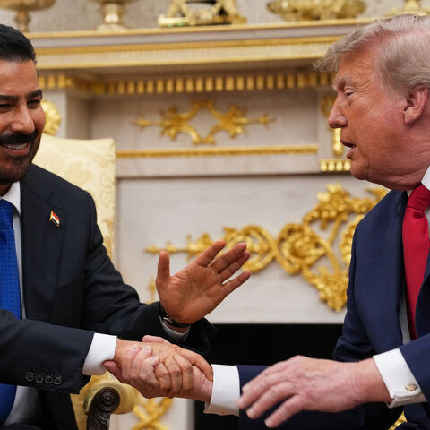 US President Donald Trump (R) shakes hands with Prime Minister of Iraq Ali al-Zaidi during a bilateral meeting in the Oval Office of the White House, Washington, July 14, 2026.