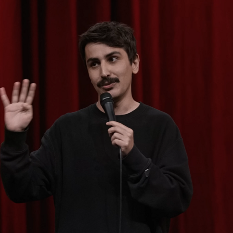 A screenshot of one of Deniz Goktas' standup routines posted to YouTube.