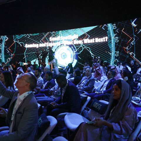 People attend the international esports gamers Next World Forum in Riyadh, Sept. 7, 2022. 