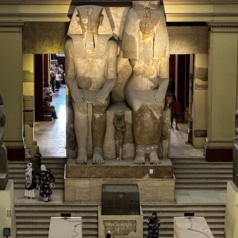 The 26-feet-tall statues of the ancient Egyptian King Amenhotep III (1391-53 BC), father of Amenhotep IV (Akhenaten) and probably grandfather of Tutankhamun, and his consort queen, Tiye, at the Egyptian Museum, Tahrir Square, Cairo, June 11, 2025.