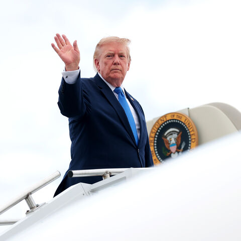 President Donald Trump waves as he boards Air Force One at Morristown Municipal Airport on Aug. 2, 2026 in Morristown, New Jersey. 
