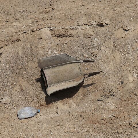 military projectile are embedded in the ground