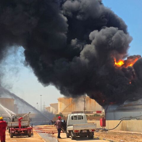 Libyan firefighting teams attempt to extinguish a fire at the Zawiya refinery, in Zawiya, Libya, on Aug. 11, 2026. — Mahmud Turkia / AFP via Getty Images