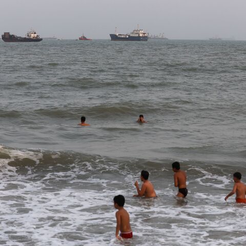 Children swimming in the Strait of Hormuz