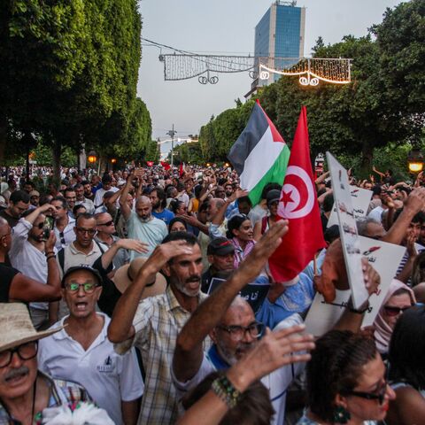 Members and supporters of the Nafas movement take part in an anti-government protest against Tunisian President Kais Saied, chanting "Degage" and calling for political change, in Tunis,Tunisia on August 20,2026. (Photo by Imen Ben Youssef / Hans Lucas / AFP via Getty Images)