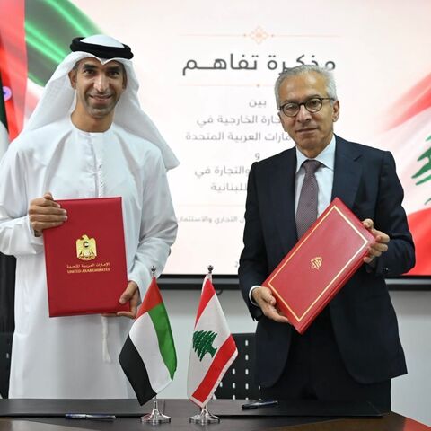 UAE Foreign Trade Minister Thani bin Ahmed Al Zeyoudi (L) and Lebanese Economy Minister Amr al-Bisat after signing a memorandum of understanding, Beirut, Aug. 27, 2026.