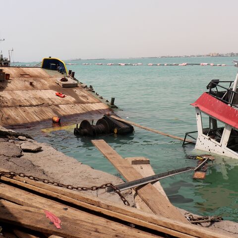 The navigation bridge of a sunken vessel is all that is seen at the surface of the water in the Port of Mocha the day after an attack by the Houthis on the city Mocha, held by Yemen's internationally recognized, Aden-based government, on Aug. 10, 2026. 