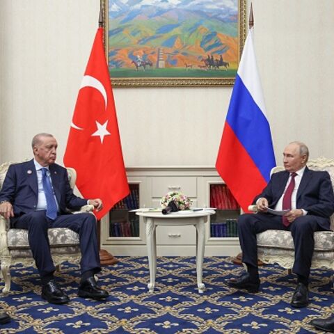 In this pool photograph distributed by the Russian state agency Sputnik, Russia's President Vladimir Putin and Turkey's President Recep Tayyip Erdogan hold a meeting on the sidelines of the Shanghai Cooperation Organisation (SCO) summit in Bishkek on September 1, 2026. (Photo by Kristina Solovyova / POOL / AFP via Getty Images)