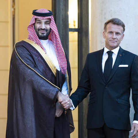 France s President Emmanuel Macron welcomes Saudi Arabia s Crown Prince Mohammed bin Salman as he arrives for a State diner in his honor at the Elysee Palace in Paris on Aug. 24, 2026.