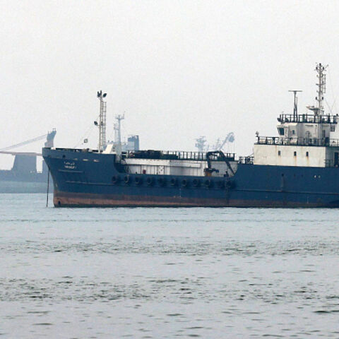 Vessels transit the Hormuz Strait off the coast of Iran's southern port city of Bandar Abbas on September 7, 2026. Iran's top negotiator threatened on September 6 of a more forceful response to any further US attacks after Tehran targeted American warships in their latest round of clashes. The exchanges of fire, which began with US raids last week, come amid a deadlock in the six-month war between the two foes. (Photo by ATTA KENARE / AFP via Getty Images) /