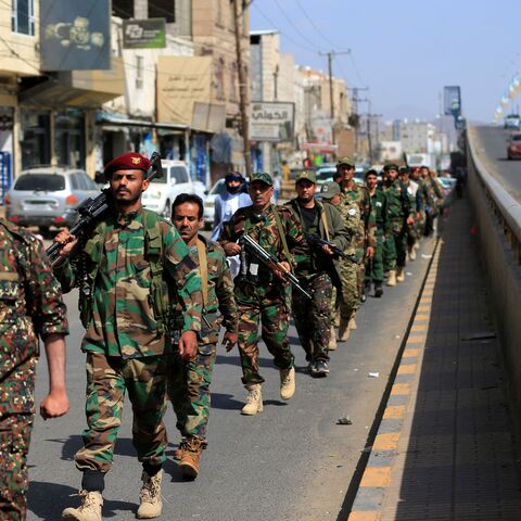 Houthi fighters marching