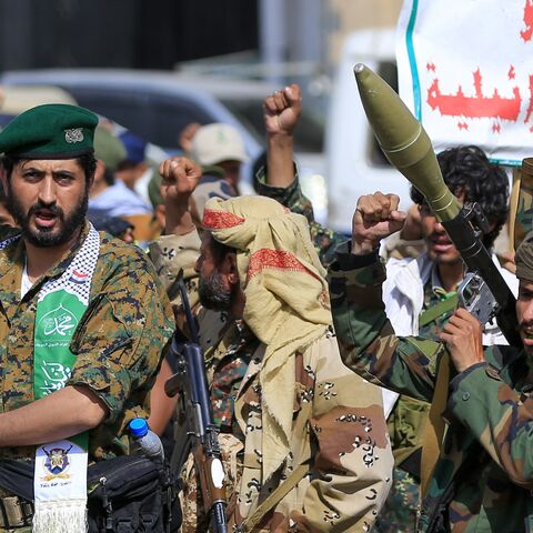Fighters loyal to the Houthi authorities shout slogans during a rally to recruit more fighters, in Sanaa, Yemen, on Sept. 10, 2026.
