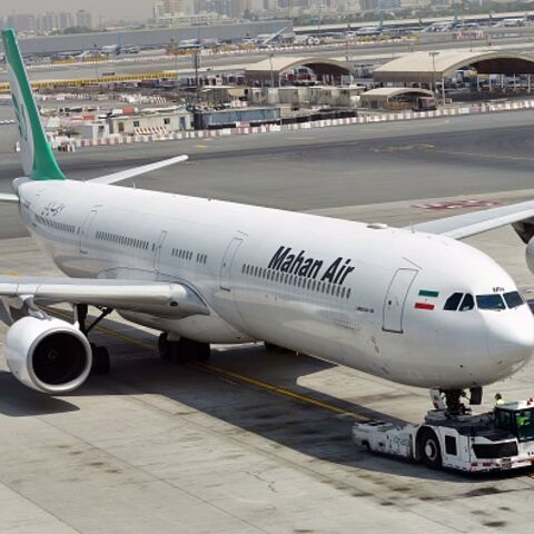 A picture take on September 14, 2017 shows an Airbus A340 of Mahan Air at the tarmac at Dubai's International Airport. (Photo by GIUSEPPE CACACE / AFP) (Photo by GIUSEPPE CACACE/AFP via Getty Images)