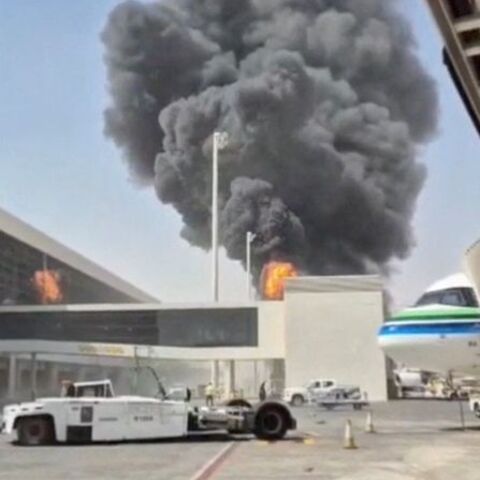 Smoke and flames rise from King Khalid Airport, after Yemen’s Iran-backed Houthis said they attacked the airport, in Riyadh