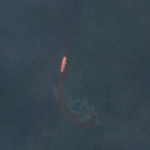 A satellite image shows an oil spill off the coast of Umm Al Quwain