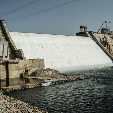 This general view shows the site of the Grand Ethiopian Renaissance Dam (GERD) in Guba, Ethiopia, on February 19, 2022. - Ethiopia's massive hydro-electric dam project on a tributary of the Nile has raised regional tensions notably with Egypt, which depends on the huge river for 97 percent of its water supply. Government officials said the dam would begin producing electricity on Sunday, more than a decade since work first started. (Photo by Amanuel SILESHI / AFP) (Photo by AMANUEL SILESHI/AFP via Getty Ima
